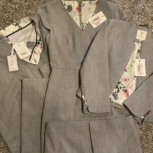 Three piece set. Pants, one peplum tailored dress, and one peplum jacket.